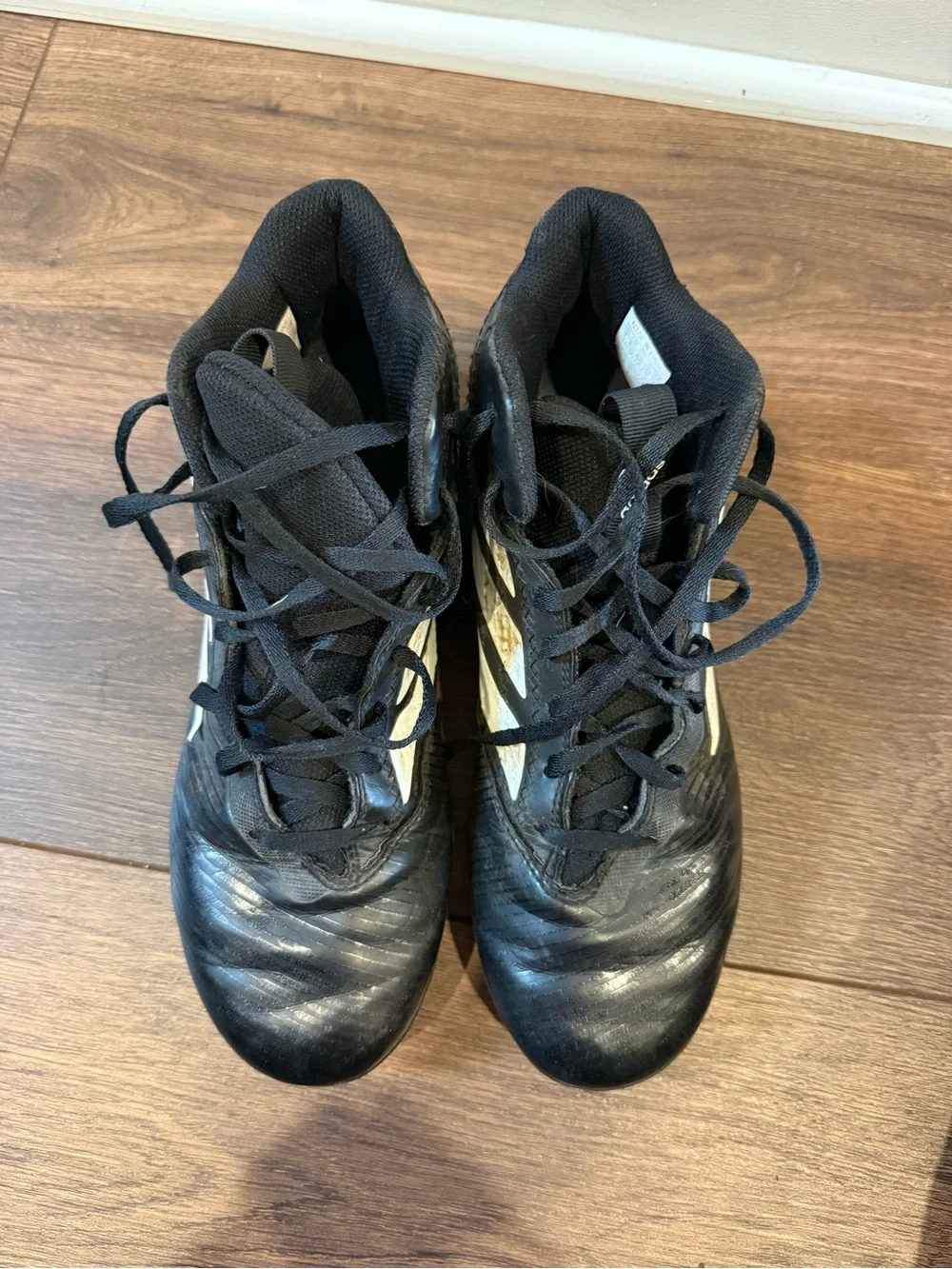 Adidas Black Football Cleats with White Stripes